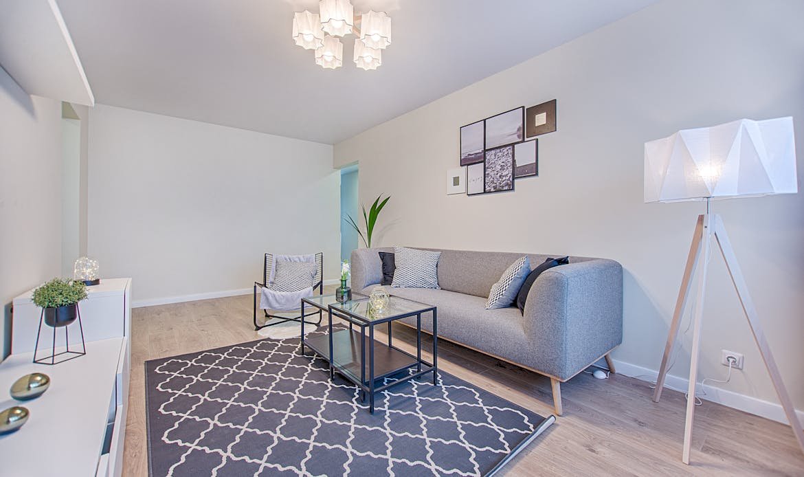 Sleek and stylish living room with modern furniture and minimalist decor in a contemporary apartment.